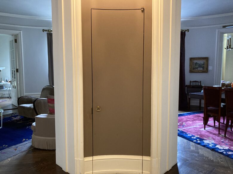 Foyer with living room on left and dining room on right