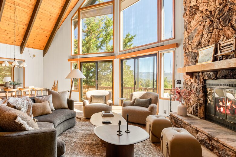 Spacious living with 20 foot floor-to-ceiling window wall