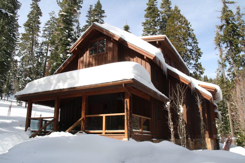 Large covered front porch and tons of snow for sledding