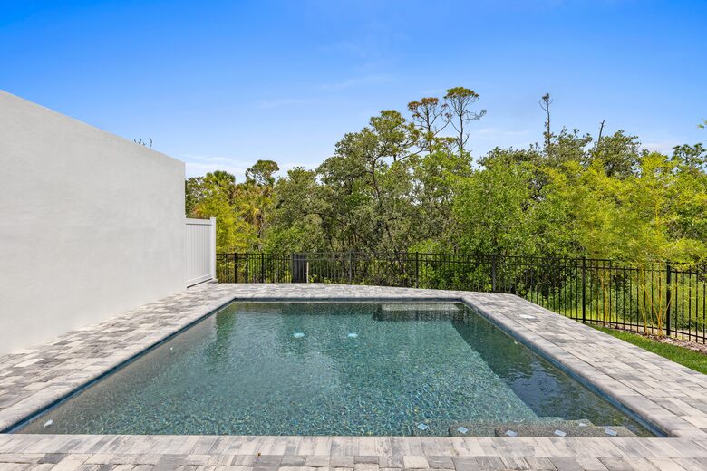 Custom Home With Boat Slip Steps from the Ocean and Town - New Smyrna Beach, Florida