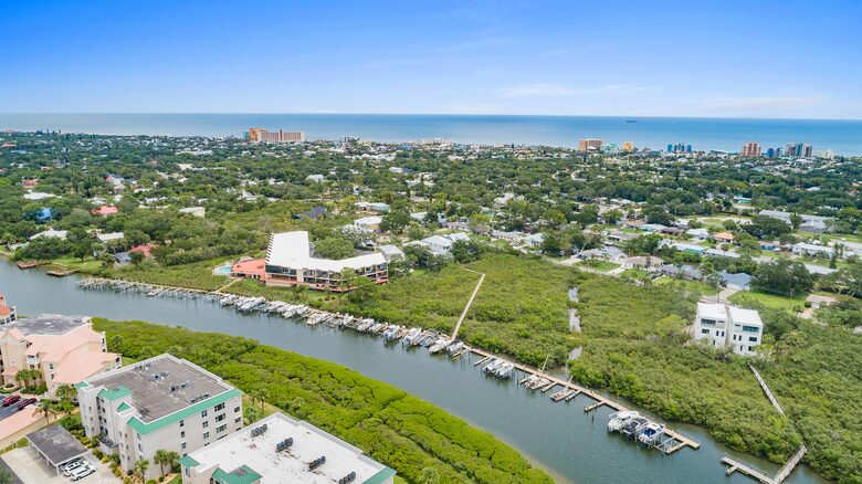 Custom Home With Boat Slip Steps from the Ocean and Town - New Smyrna Beach, Florida