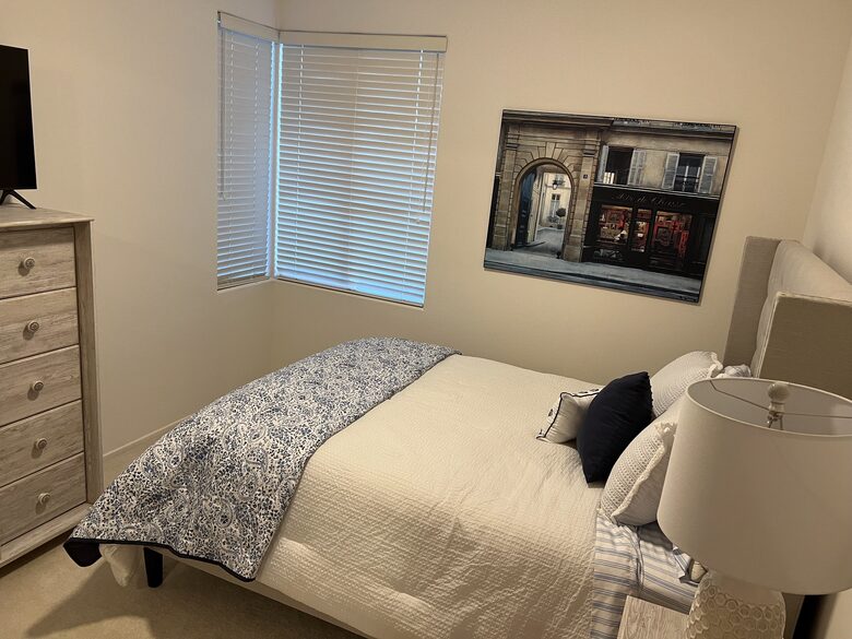 1 of 2 queen size guest rooms