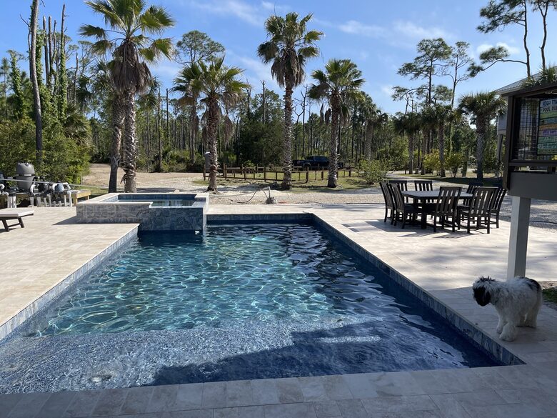High Times bayfront with pier, swimming pool and 2 hot tubs on #1 Beach in America - St George Island, Florida