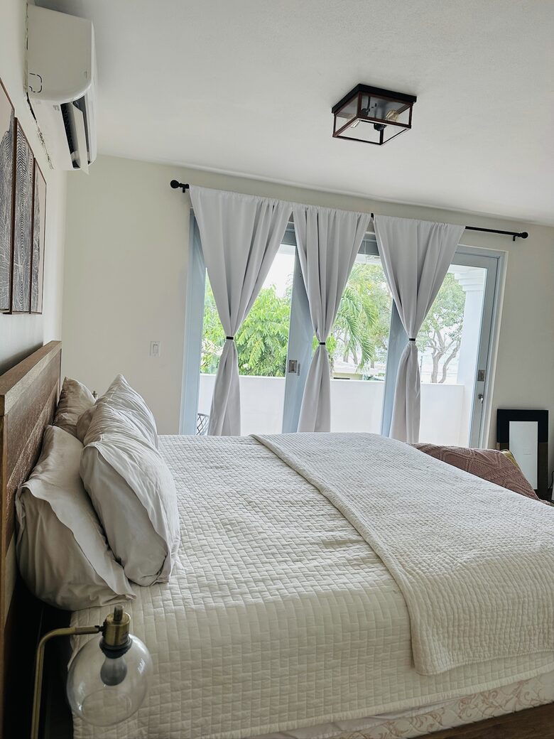 Master bedroom with balcony & ocean view