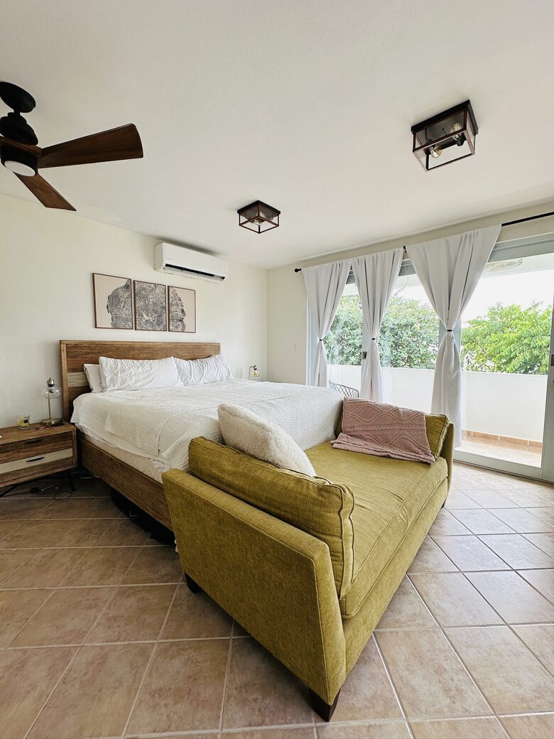Master bedroom with extra day bed