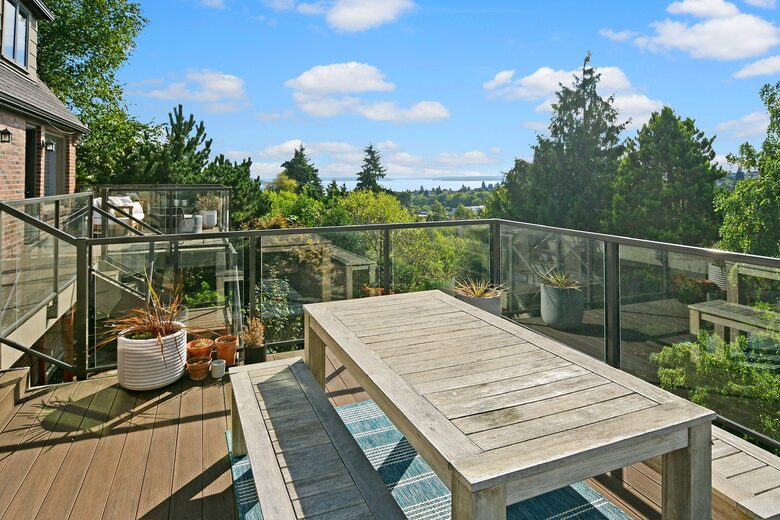 Expansive back porch with water views