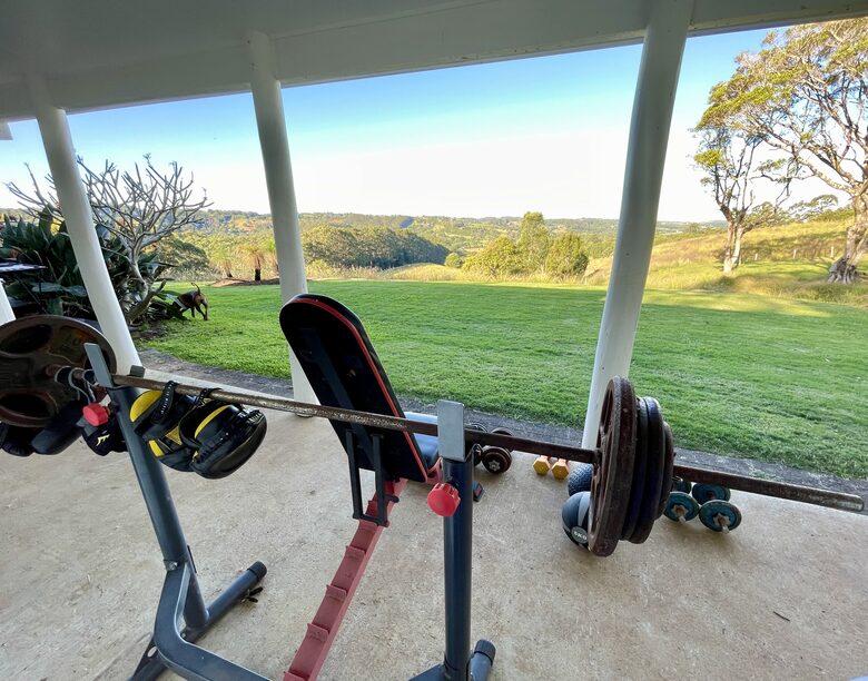 Outdoor weights gym overlooking scenic valley views
