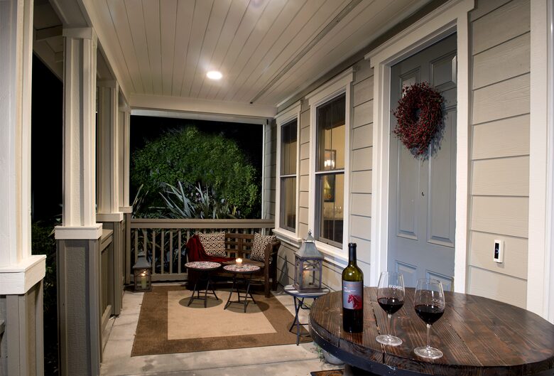 Enjoy happy hour on the covered front porch.