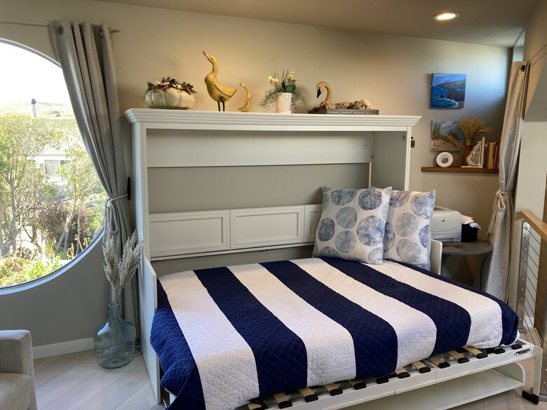 Murphy bed/desk combo open for guest use.