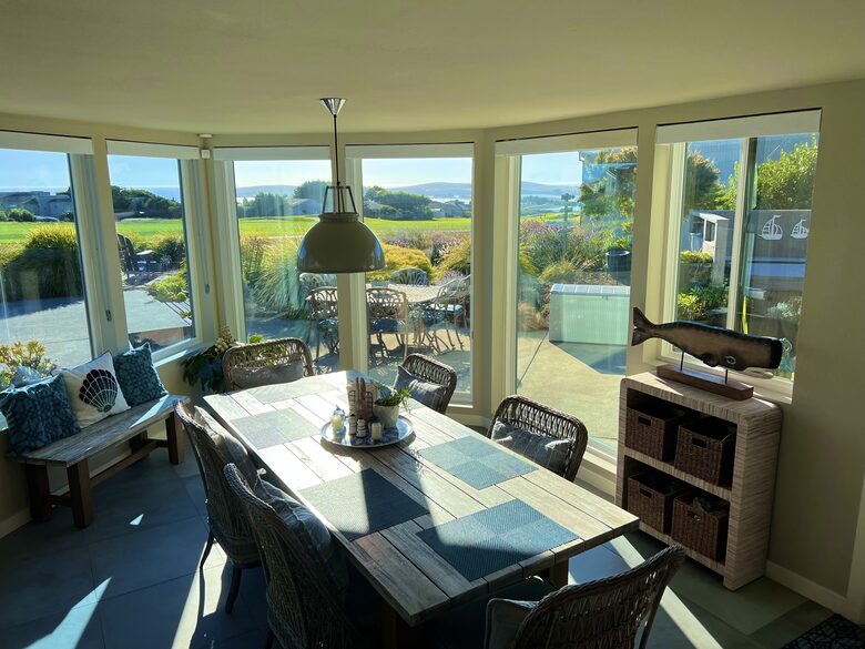 Dining room comfortably seats 6 or up to 10 with benches.