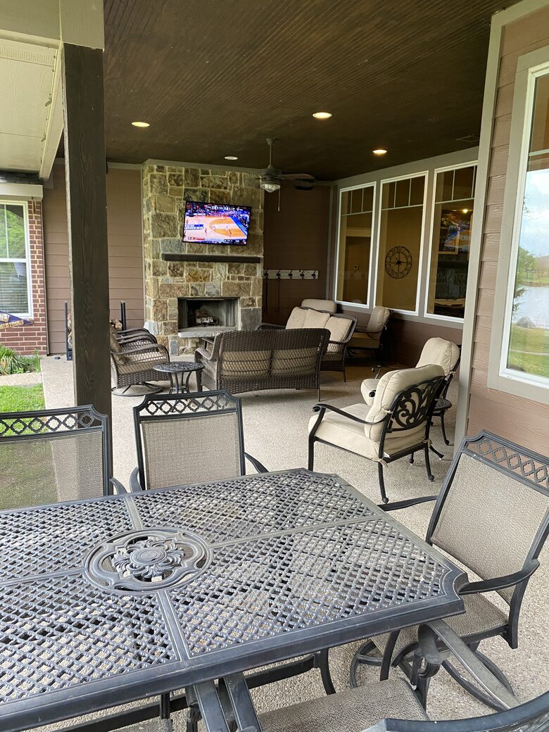Outdoor Living area with fireplace and outdoor TV