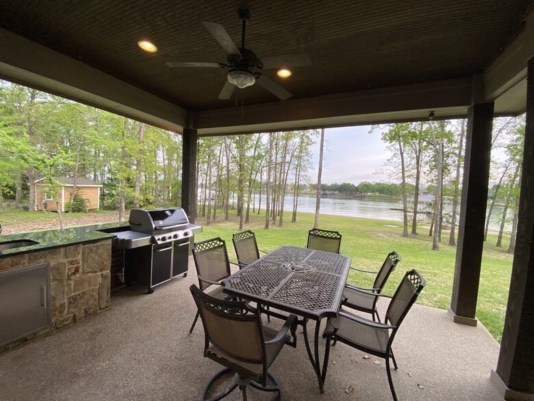 Outdoor Dining area and kitchen with great views of the lake