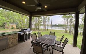 Outdoor Dining area and kitchen with great views of the lake