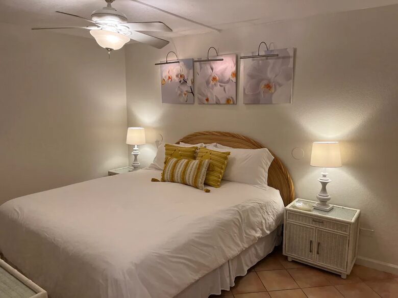 Master bedroom with king bed and attached full bathroom