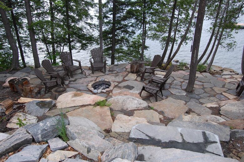 outdoor firepit area close to lake
