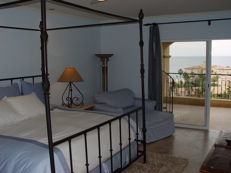 First master bedroom; king bed; ocean view; opens to balcony