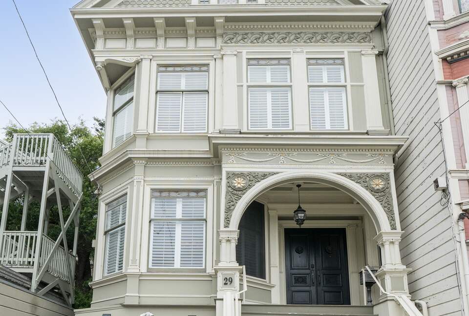 The main door at the top of a flight of stairs