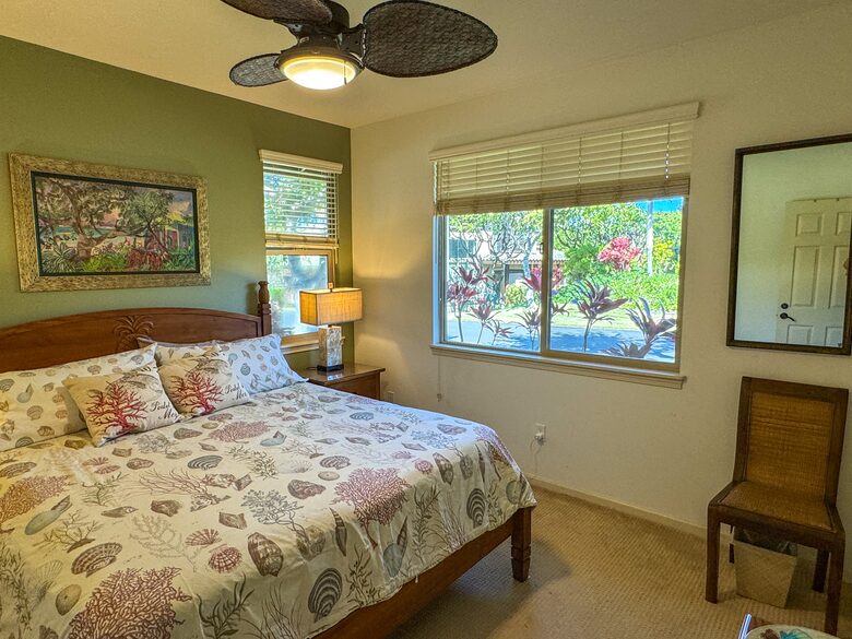 Main floor bedroom with adjacent bathroom