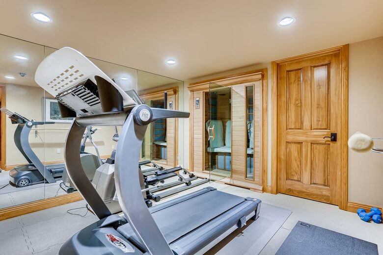 home gym w/ SAUNA, treadmill, elliptical and barre