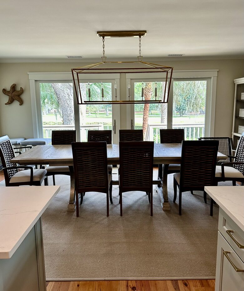 Breakfast room table off kitchen, overlooking deck & lagoon.