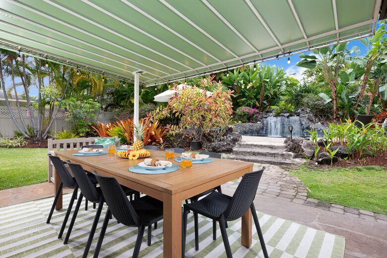Lanai view of pool, waterfall & backyard