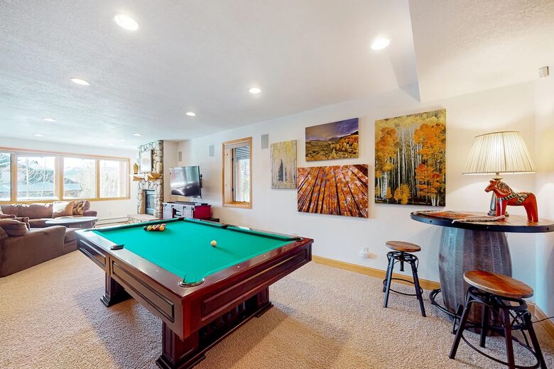 Fun basement with pool table. And bar. And shotski!