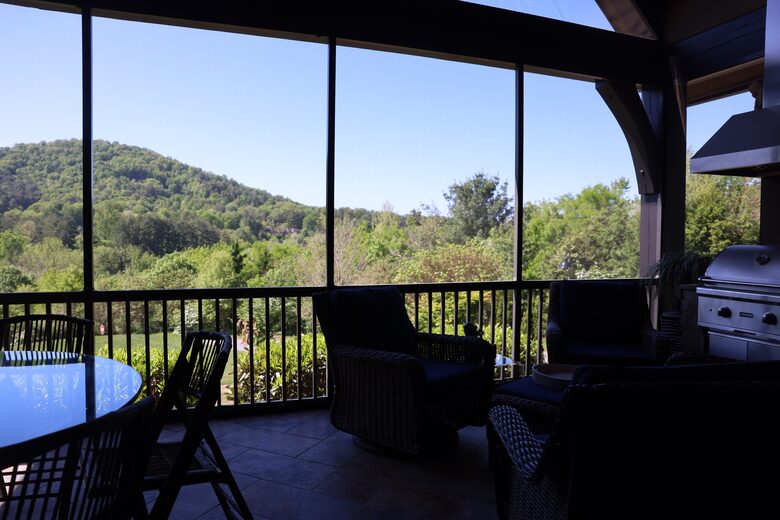 Amazing views screened in porch fireplace and built in grill