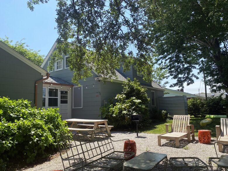 Picnic table, charcoal grill, fire pit, lounge chairs