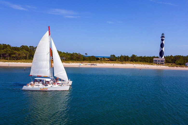 Take a charter sail out to Cape Lookout and climb to top of lighthouse