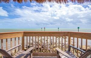 View from gazebo tiki hut at boardwalk end
