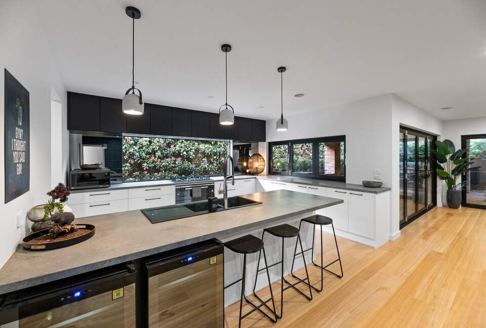 Gourmet kitchen and servery to Alfresco 12-seater dining table