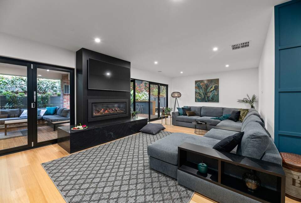 Open plan oversized lounge room and gas fireplace