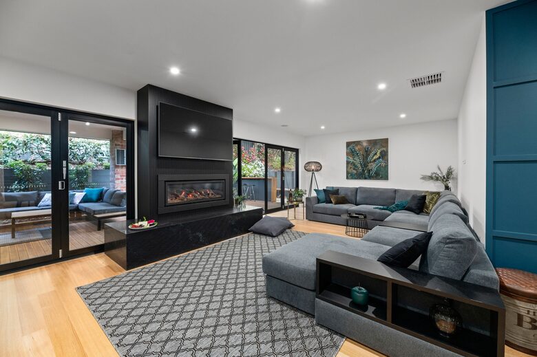 Open plan oversized lounge room and gas fireplace