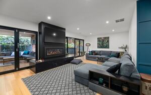 Open plan oversized lounge room and gas fireplace