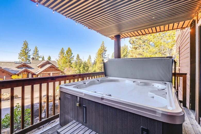 Covered hot tub off the lower deck