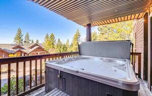 Covered hot tub off the lower deck