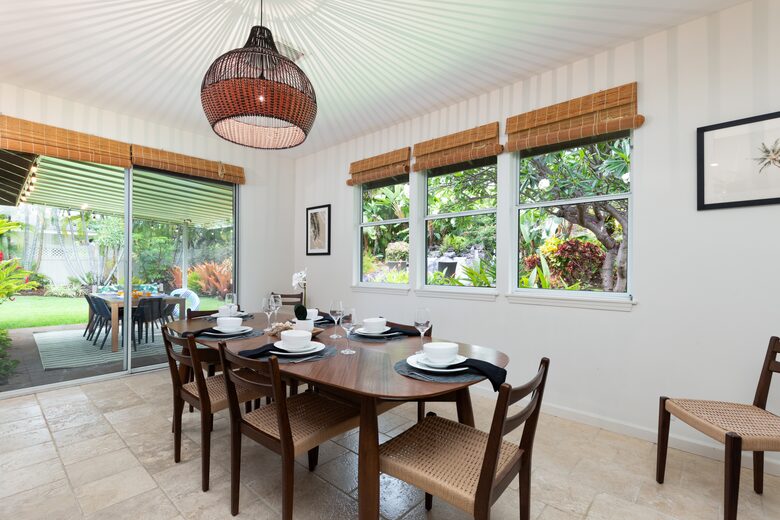 Dining room with views of the beautiful landscaped backyard