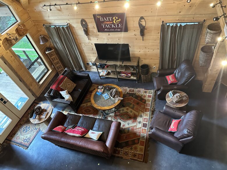 Living room has 2 recliners, sofa & loveseat twin sleeper