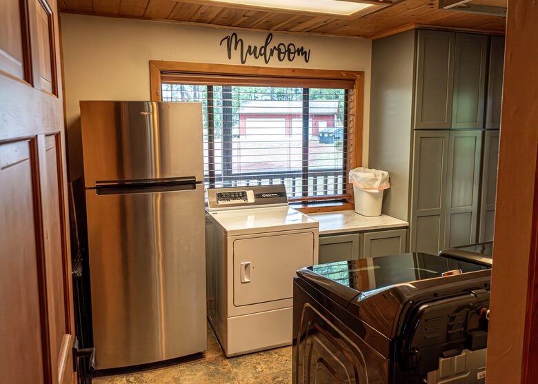 Laundry Room - Main Floor - 3 Dryers, 2 Washers, Fridge