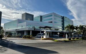 Just in front of this Hospital, pharmacy, restarurants, etc