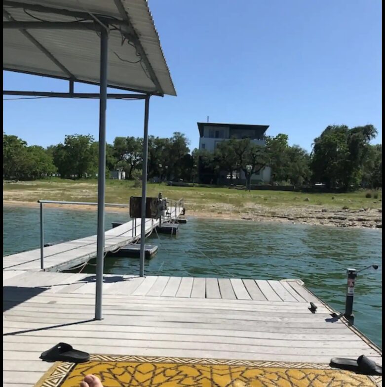 This image is from old dock. Shows back yard and the house