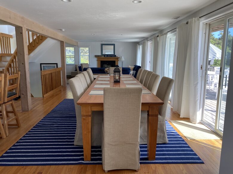 Dining area seats 12 with sliders to deck