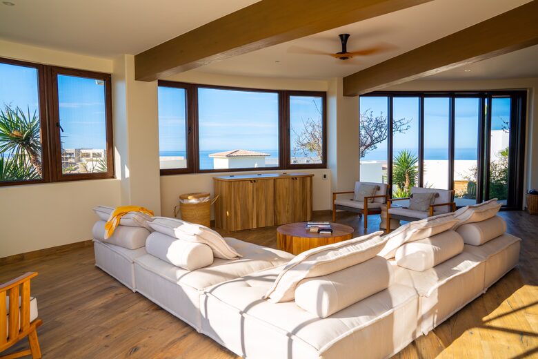 Main living space. Large sofa and pop up TV cabinet