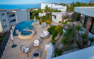 Backyard with ocean view, pool, spa and fire pit. View from the roof.