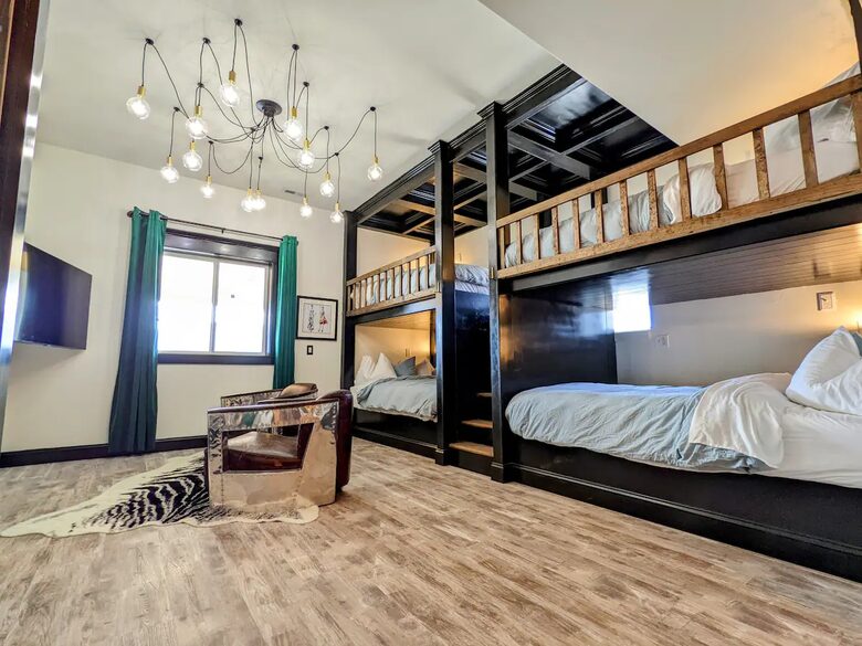 Four queen bunks with private reading lights and smart TV