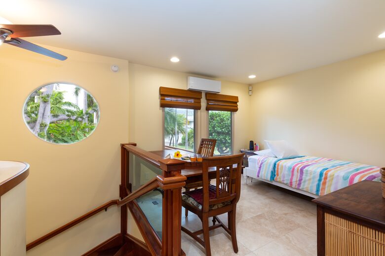 Upstairs Office area with a twin bed