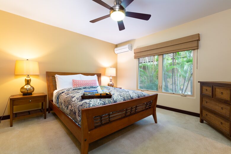 Second downstairs bedroom with a queen bed