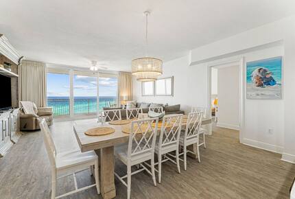 8 seats at dining table with view of ocean