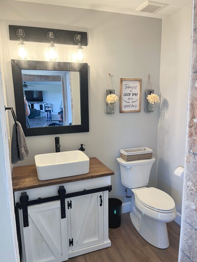 Powder room near kitchen
