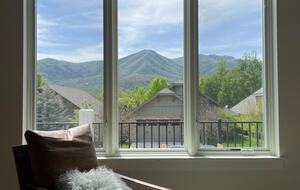 View of Wasatch mountains in the background from living room window